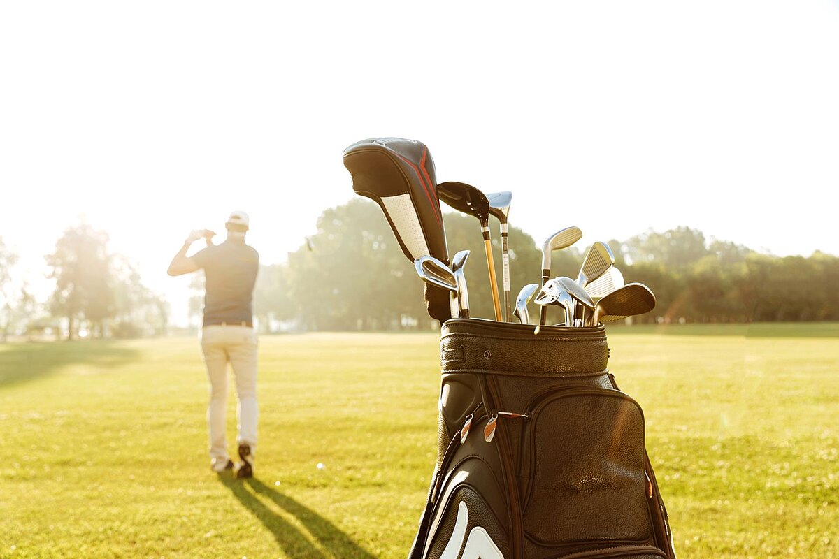Golfschaeger und Tennisspieler